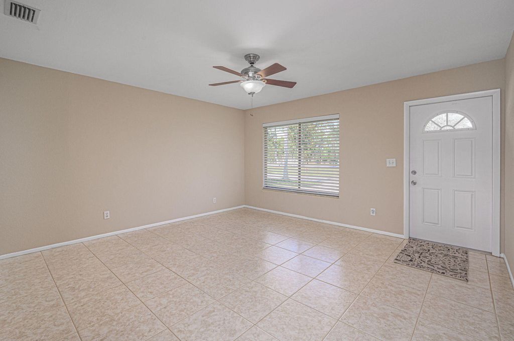 Photo of 1919 SE Millbrook Terrace SE, Port Saint Lucie, FL 34952 (MLS # R10959548)