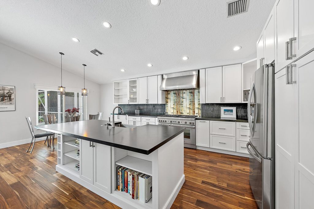 Photo of 130 Jones Creek Drive, Jupiter, FL 33458 (MLS # R11078191)