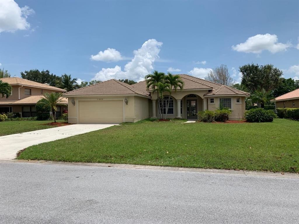 Photo of 1205 SW Live Oak Cove, Port Saint Lucie, FL 34986 (MLS # R10695055)