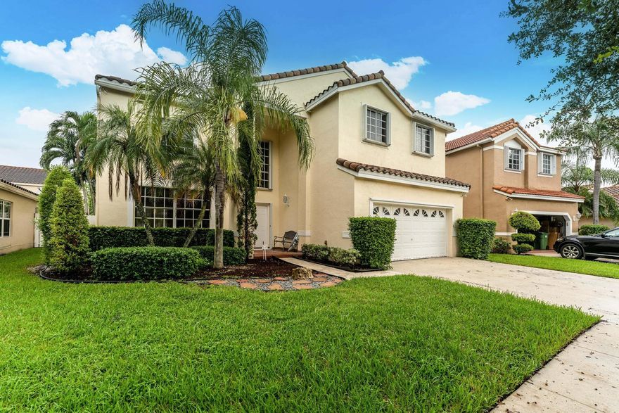 A MUST SEE... Stunning cul-de-sac home, move in ready, 4 bedroom, 2 1/2 bath home with a 2 car garage located in the prestigious city of Weston..in the community of the Lakes.  This home has high ceilings and a COMPLETELY REMODELED Kitchen, be the 1st to cook in this amazing open kitchen with stainless steel Frigidaire professional appliances including a wine cooler and large wine rack.  Oversized Master has his/ hers walk-in closets, an additional 12x14 extended area ideal for a home office or just a comfy sitting room! Large family room with hurricane impact sliders over looks the pool area, great for entertaining.  Laundry room located in the house. Fenced yard.  24/7 guard-gated community with pool and numerous amenities.  Weston Schools are rated A+