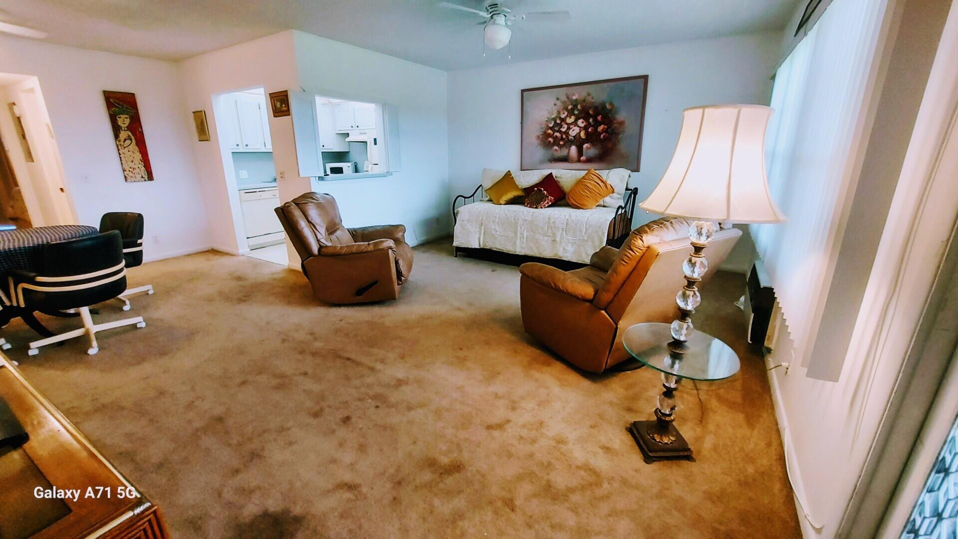 AMAZING PRICE!!! This is a 55plus community!Hard to beat this annual rental price!!!! Furniture included! This is a cute condo, very reasonably priced for a 1 bedroom 1.5 bath in Century Village. It is one of the closest buildings to the clubhouse and houses of worship. Price is for annual rental . Seasonal renting for 4 months min is higher. Nestled within the fabulous Century Village 55+ community, this impeccable 1-bedroom 1.5 bath, condo offers a comfortably furnished condo. The layout integrates the living and dining areas, allowing for dining, relaxation and entertainment. 2 a,c, units. The kitchen opens with a pass-through to the living room and a doorway to the dining area. The master suite features a full bathroom with tub. There is also guest powder bathroom.