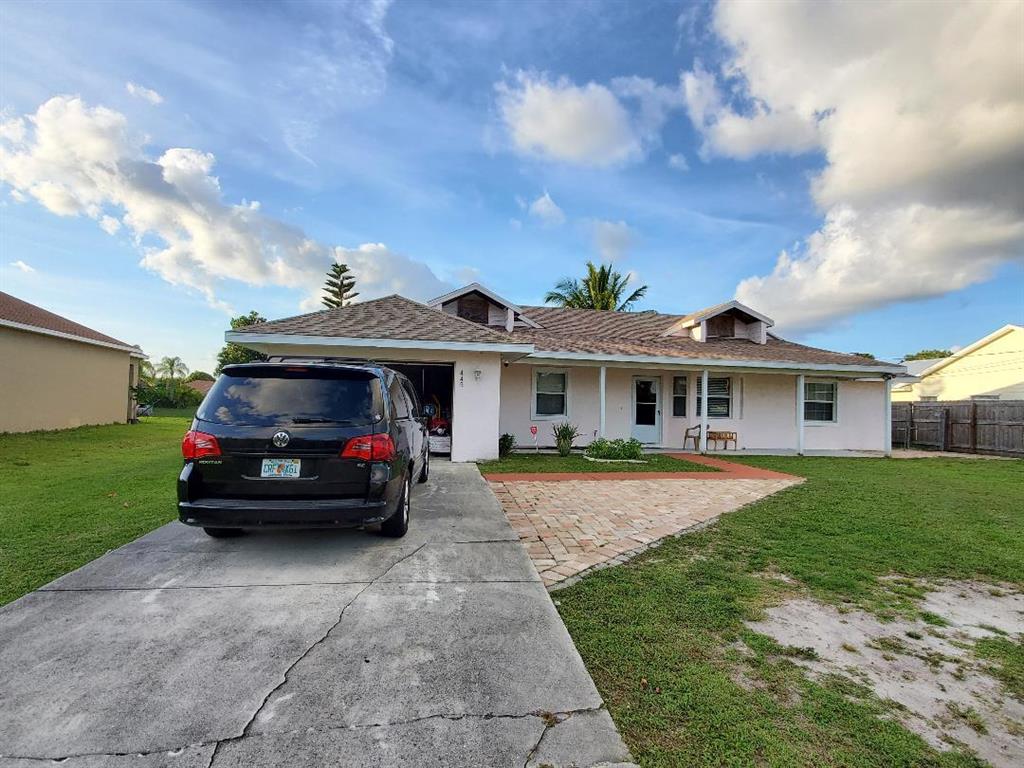 Photo of 445 SW Cherryhill Road, Port Saint Lucie, FL 34953 (MLS # R10714449)