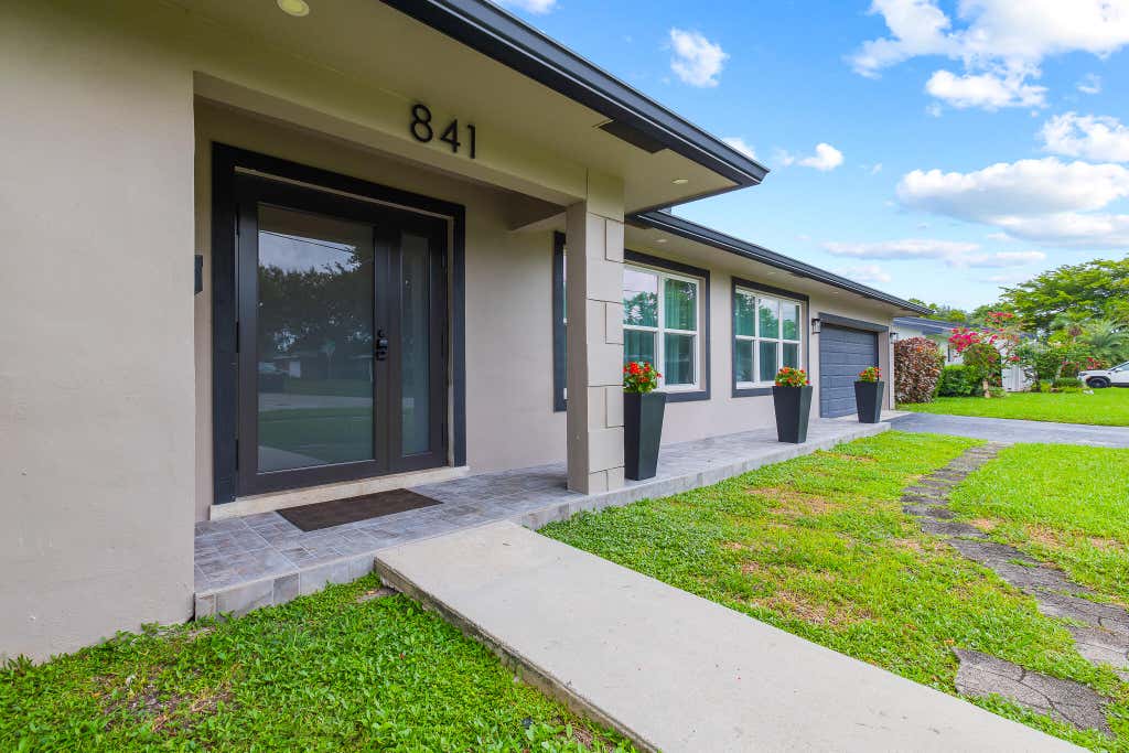 Photo of 841 NW 75TH Terrace, Plantation, FL 33317 (MLS # B26061877)