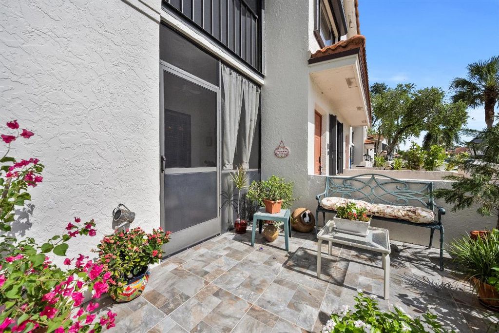 Photo of 9668 Sills Drive E #101, Boynton Beach, FL 33437 (MLS # R11110944)