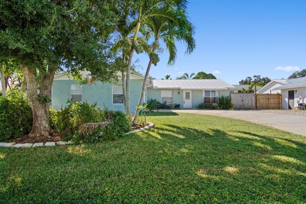 Photo of 9032 SE Sandridge Avenue, Hobe Sound, FL 33455 (MLS # R11137236)