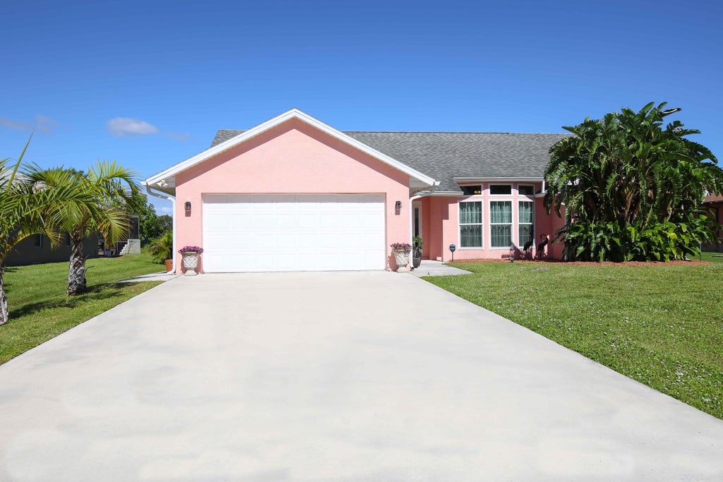 Photo of 6830 NW Granger Avenue, Port Saint Lucie, FL 34983 (MLS # R11034352)