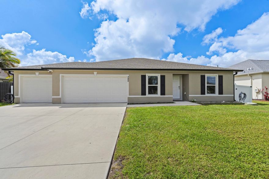 Welcome to this stunning 3-bedroom, 2-bath home built in 2023, offering 1,552 sq ft of thoughtfully designed living space. This well-maintained home features an open-concept layout with a spacious kitchen boasting stainless steel appliances, pantry, breakfast bar, and seamless flow into the family room—perfect for both everyday living and entertaining. The light-filled family room opens through sliding glass doors to a private backyard retreat complete with a paver patio, pergola, fire pit, and fully fenced yard—ideal for relaxing or hosting gatherings. Enjoy a desirable split floor plan for added privacy, along with both a formal dining room and separate living room to suit your lifestyle. Conveniently located just minutes from the Florida Turnpike, I-95, shopping, dining, and more.
