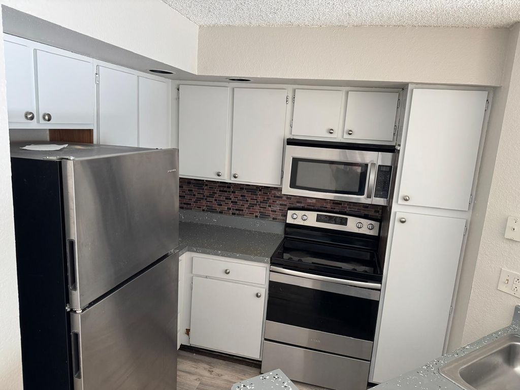 Photo of 3480 Pinewalk Drive #123, Margate, FL 33063 (MLS # F10496157)