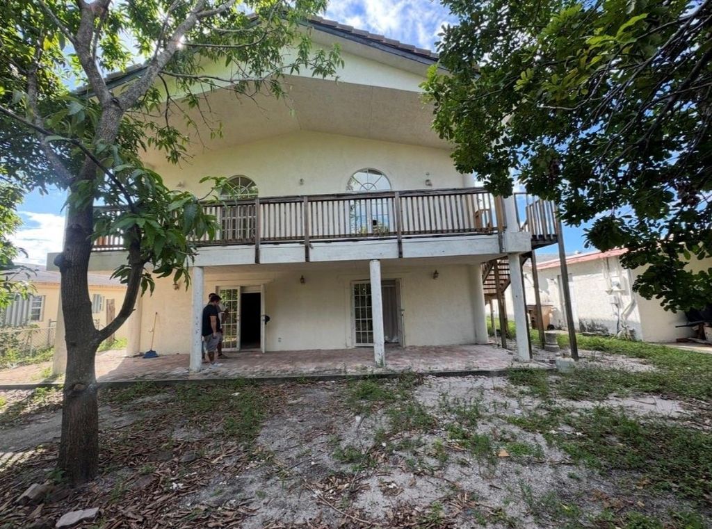 Photo of 472 NW 2nd Terrace, Deerfield Beach, FL 33441 (MLS # F10544246)