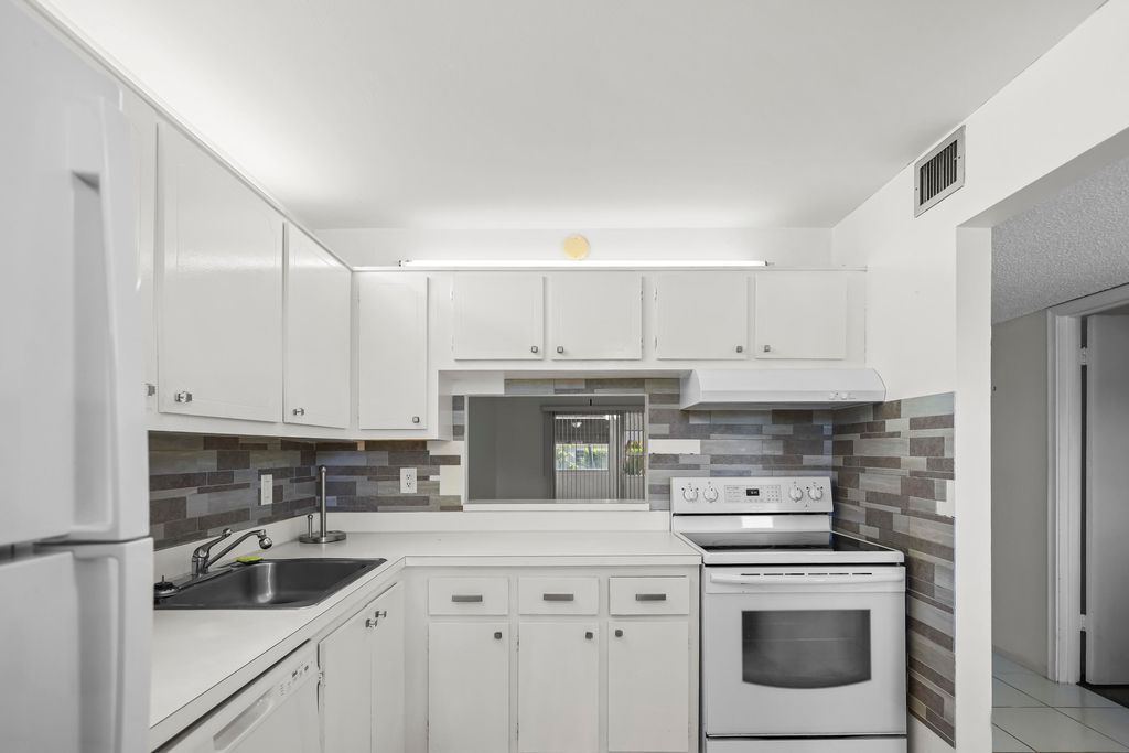 Photo of 2500 Fiore Way #103a, Delray Beach, FL 33445 (MLS # B26015976)