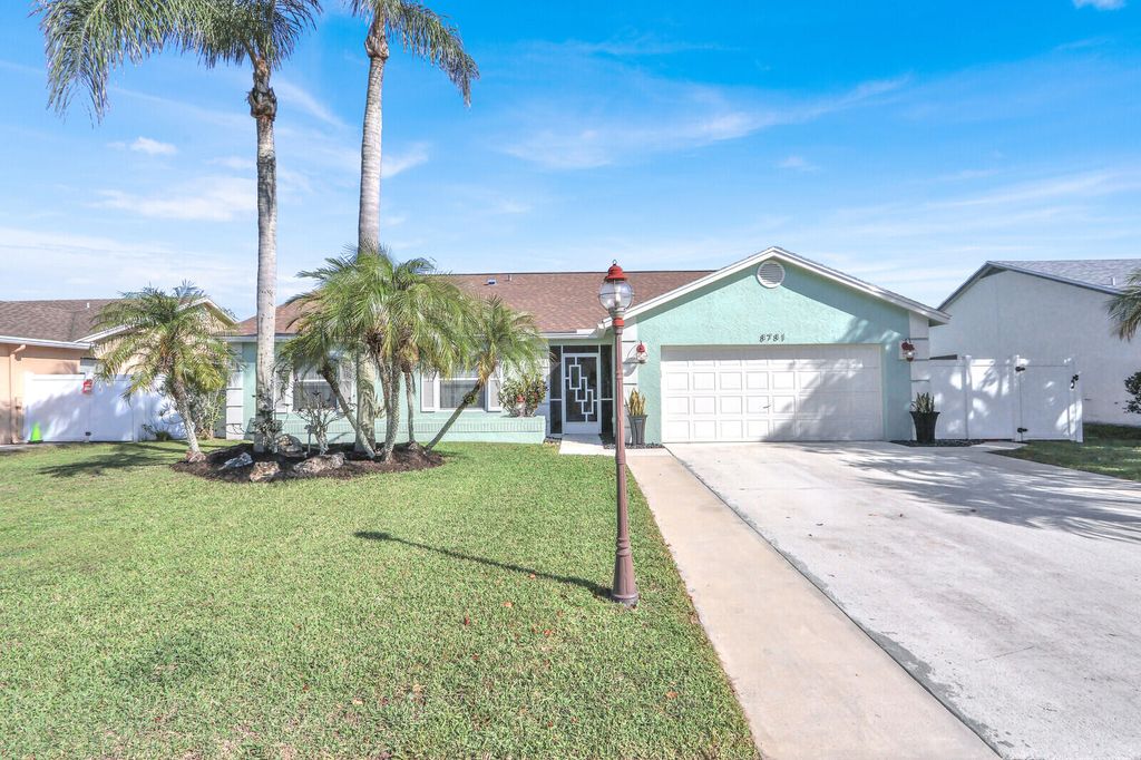 Photo of 8781 Sand Lake Court, Lake Worth, FL 33467 (MLS # B26007083)