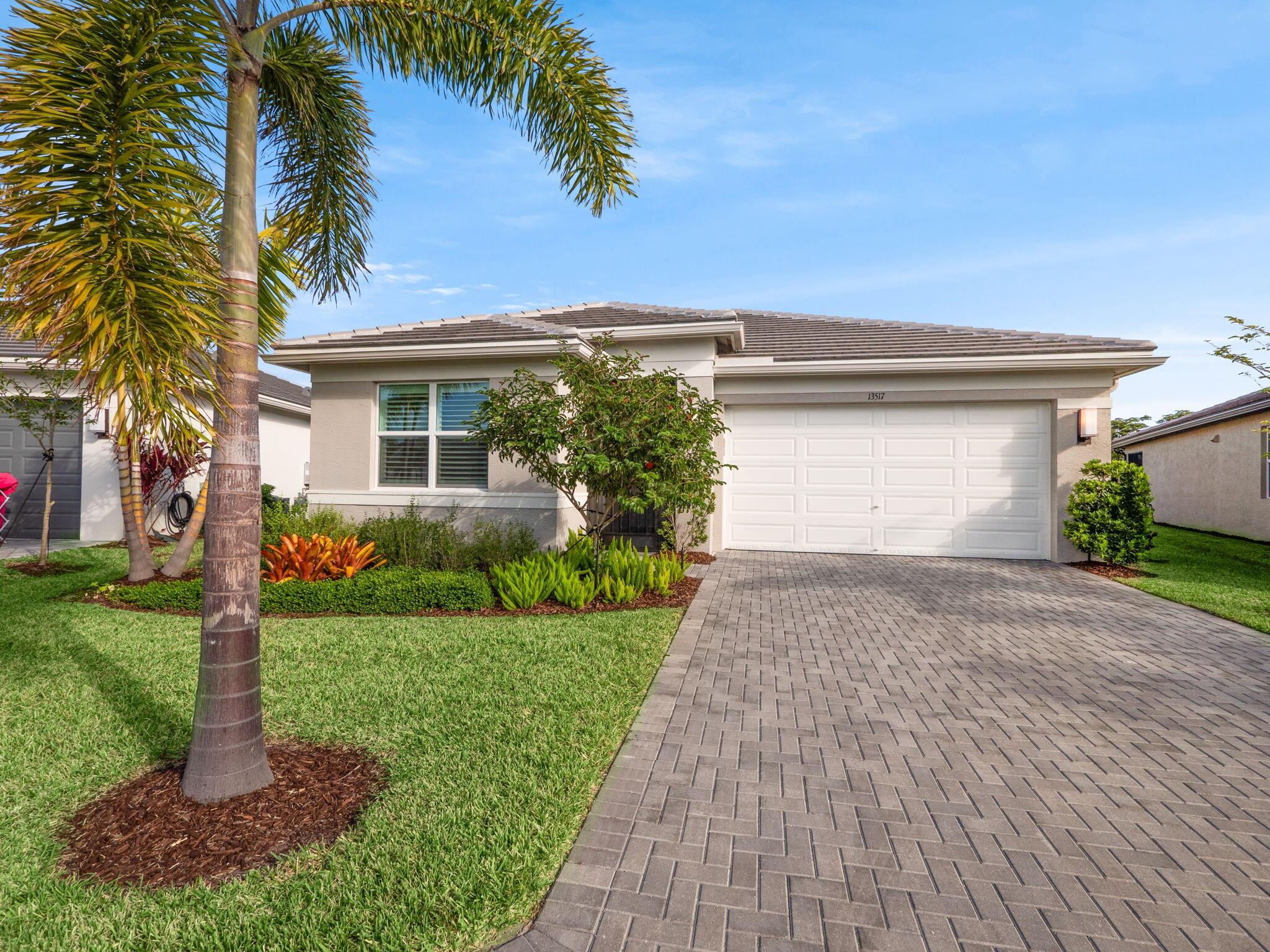 JUST TOO PERFECT AND PRETTY! Spacious Sandpiper model ready for you! Don't wait to build a home; this home is ready and located on a magnificent lot. Large backyard for your doggies, or just to spend time taking in the sunshine. Did I mention it is fully fenced! The home features, 2 airy and bright bedrooms, 2 upgraded tiled, bathrooms, cozy den with double doors for privacy, laundry room with storage cabinets and utility sink! Large great room area with large wall to wall sliders which bring the outside indoors to enjoy the Florida weather. All windows have the upgraded bahama shutters. Screened in patio, with a large extended area for your BBQ and lawn chairs. Owners do not live full time...so house is practically brand new! Allow me to show you this lovely home!