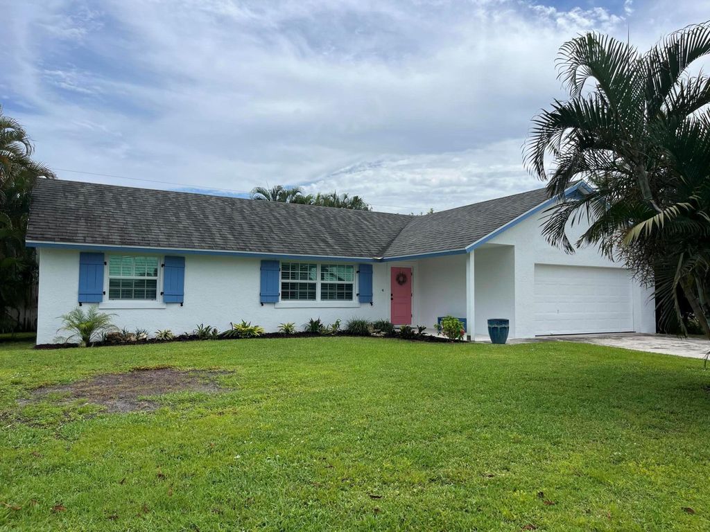 Photo of 8014 SE Carlton Street, Hobe Sound, FL 33455 (MLS # R11018832)