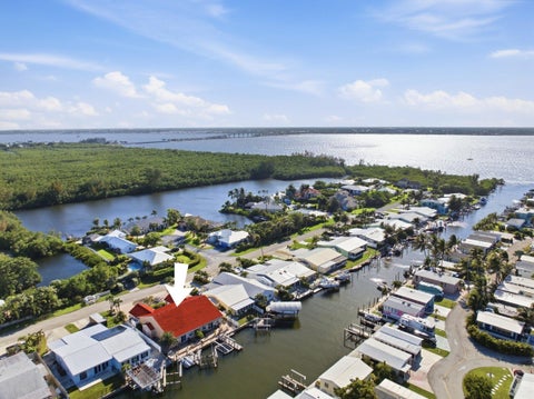 Photo of 60 AQUA RA Drive, Jensen Beach, FL 34957 (MLS # B26090304)