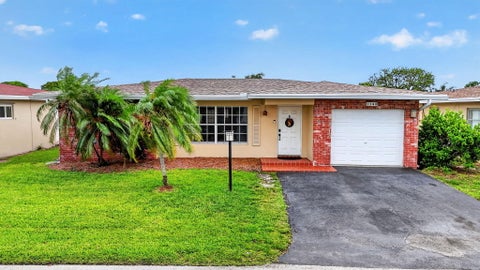 Photo of 1140 NW 49th Street, Deerfield Beach, FL 33064 (MLS # B26037900)