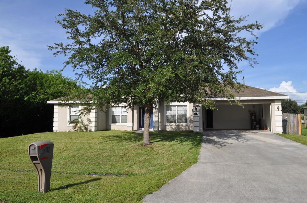 Photo of 4117 SW Rardin Street, Port St Lucie, FL 34953 (MLS # R10899733)