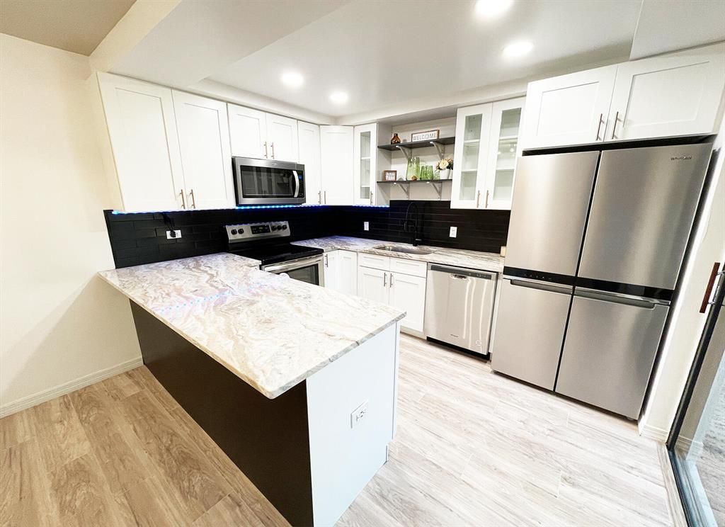 Photo of 215 2nd Lane Ln, Palm Beach Gardens, FL 33418 (MLS # R10807294)