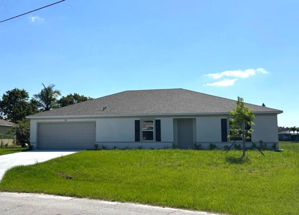 Photo of 2386 SE Manor Avenue, Port Saint Lucie, FL 34952 (MLS # R11085469)