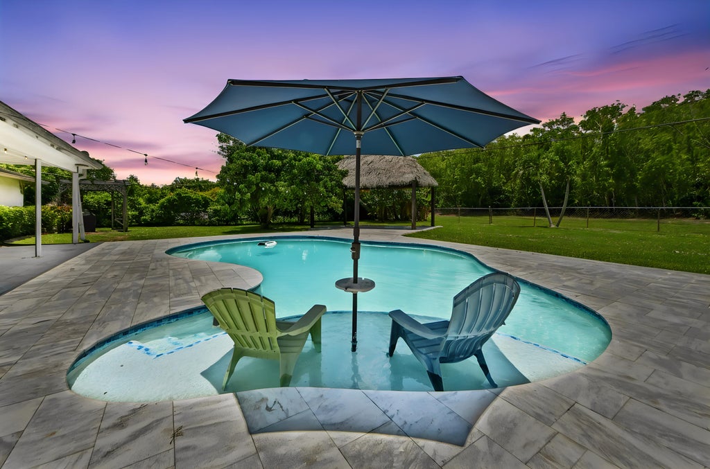 Photo of 7635 Oakmont Drive, Lake Worth, FL 33467 (MLS # B26044868)