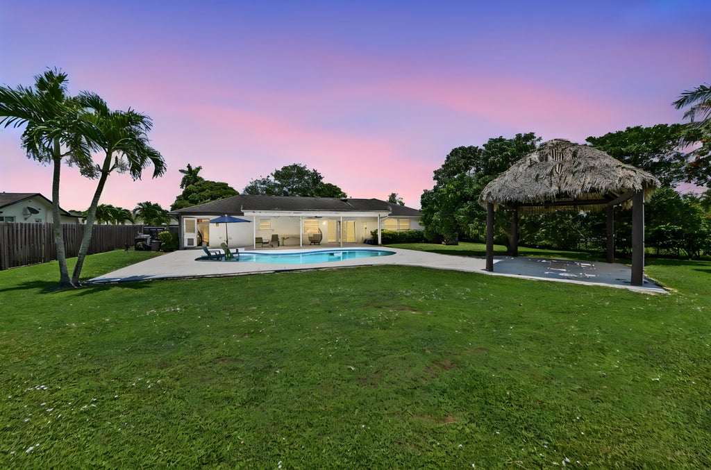 Photo of 7635 Oakmont Drive, Lake Worth, FL 33467 (MLS # B26044868)
