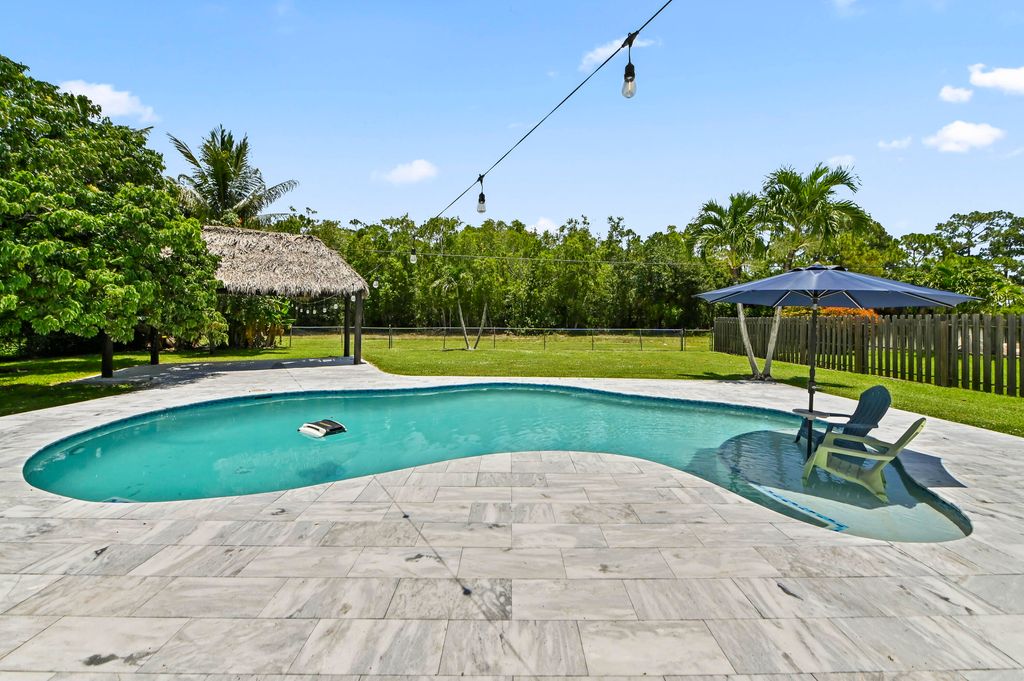 Photo of 7635 Oakmont Drive, Lake Worth, FL 33467 (MLS # B26044868)