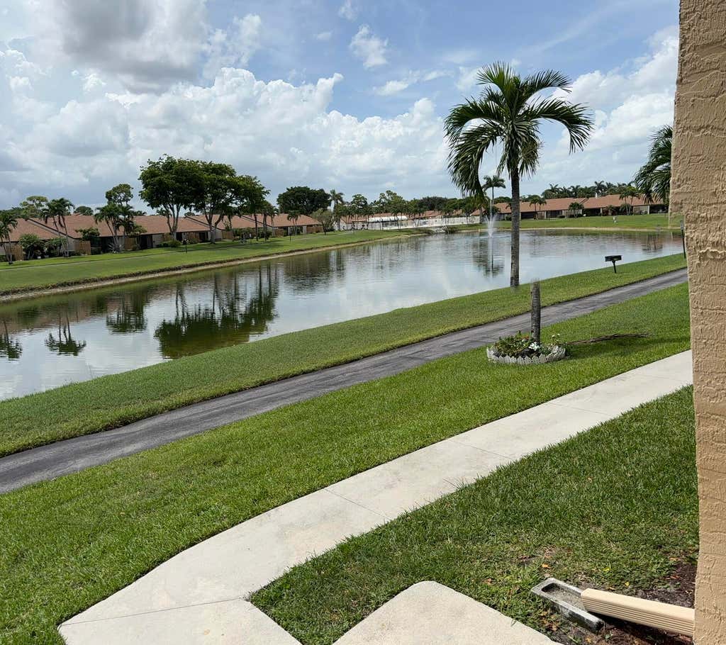 Photo of 826 Sky Pine Way #G2, Greenacres, FL 33415 (MLS # B26062346)