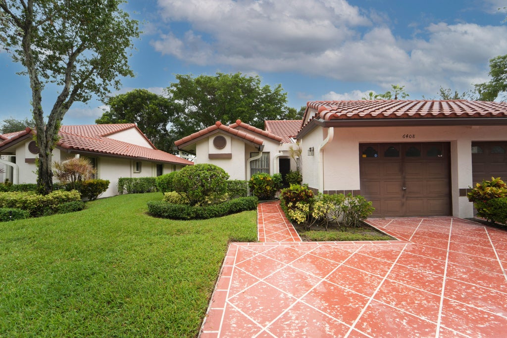 Photo of 6408 Kings Gate Circle, Delray Beach, FL 33484 (MLS # B26083199)