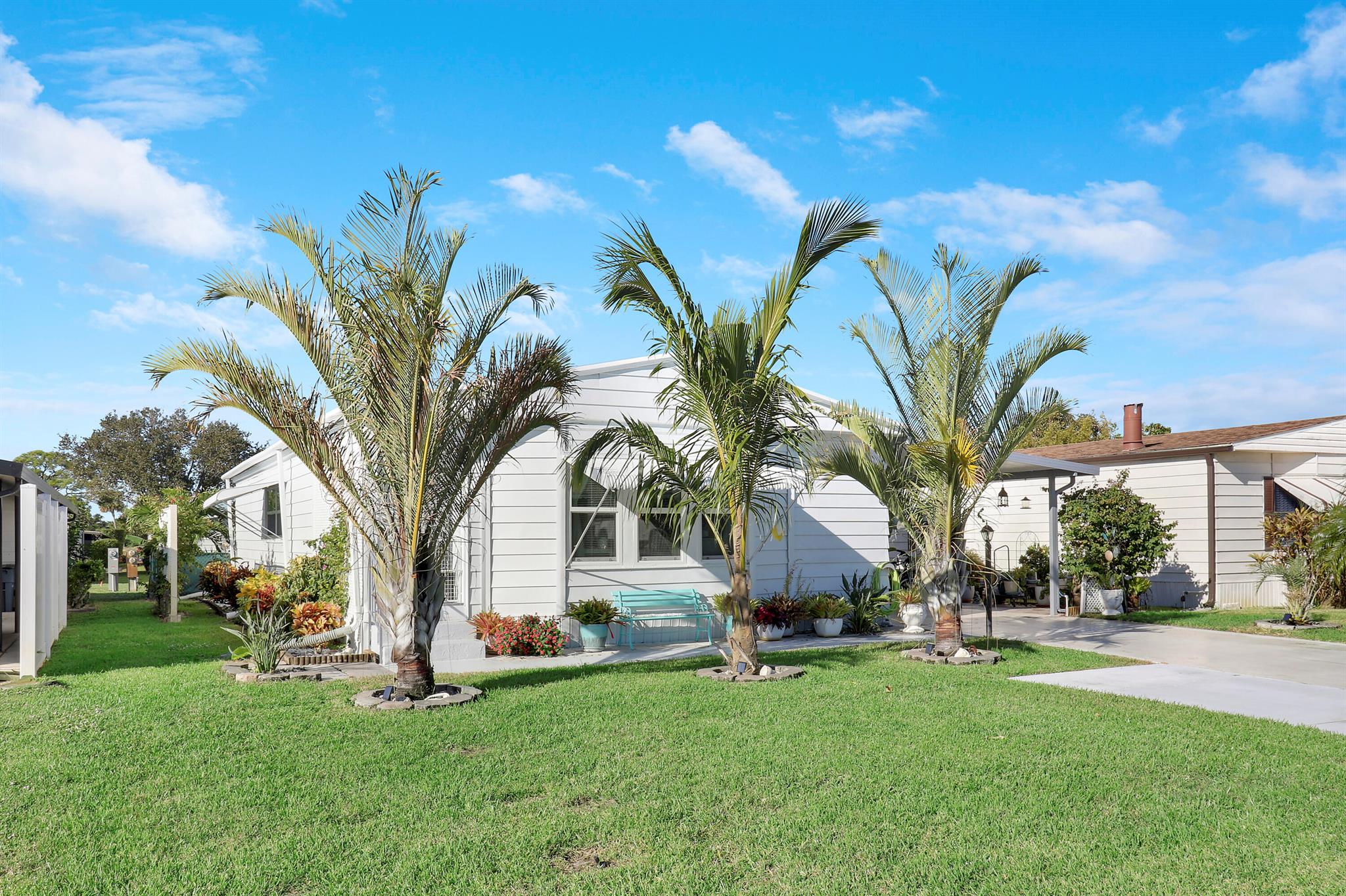 Welcome to your Florida oasis! This updated 2-bedroom, 2-bathroom home is in the sought-after 55+ community of Cambridge at Heritage Ridge. Situated on owned land, this residence boasts a remodeled kitchen and bathrooms, impact windows, and an air-conditioned enclosed front room. The backyard is a private retreat featuring a roofed patio, perfect for relaxation or entertaining guests.Residents enjoy a wealth of community amenities, including a heated swimming pool, clubhouse, fitness center, billiards, shuffleboard, and a variety of social events and clubs. With low HOA fees and a vibrant community atmosphere, this home is ideally located near beaches, shopping, and dining. Don't miss the opportunity to embrace the 55+ lifestyle in this charming home.