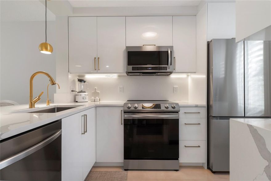 This Florida condo was meticulously crafted by a distinguished home builder and designer couple. It features rectified porcelain floors, solid core doors, and custom wood moldings throughout. The kitchen boasts Calacatta Quartz countertops and brass accents, complemented by Samsung stainless steel appliances.The master bathroom exudes tranquility with black hardware and quartz countertops. The master bedroom offers serene lake views, a walk-in closet, and custom window plantation shutters. The balcony provides peaceful views of the lake and garden, with a screened, wood-decked space and a ceiling fan for added comfort.Experience the epitome of Florida living in this thoughtfully designed condo, where luxury and functionality converge seamlessly, creating a home like no other. This Florida condo stands as a testament to unparalleled luxury, meticulously crafted by a distinguished luxury home builder and his visionary designer wife. From its inception as a forever vacation home in Florida, this residence reflects an unwavering commitment to perfection, sparing no expense and overlooking no detail as the family eventually outgrew it.Nestled within the Cypress Bend community in Pompano Beach, this condo is situated in the newest and most impeccably managed section. Rectified porcelain floors flow seamlessly throughout the space, providing an elegant foundation. Solid core doors and custom wood moldings add a touch of sophistication, contributing to the condo's overall aesthetic. The in-unit laundry closet is equipped with a washer and dryer combo unit, complemented by a thoughtfully designed organizer for added convenience.The kitchen serves as the heart of this home, where Calacatta Quartz waterfall countertops exude luxury and create an exquisite space for your culinary endeavors. Brass faucet, pendant light fixtures, and hardware add opulence to the culinary space, while Samsung stainless steel appliances seamlessly blend modern technology with high-end design.The master bathroom is a sanctuary of tranquility and refinement, featuring black hardware, quartz countertops, and a brass framed mirror and pendant lights.The master bedroom is a haven of comfort and style, with serene lake views creating a calming backdrop. A walk-in closet with a thoughtfully designed organizer ensures efficient storage and organization. Custom window plantation shutters and a cool, uplifting striped blue and white wallpaper accent wall contribute to the room's distinctive charm.In the second bedroom, practicality and aesthetics converge seamlessly with a built-in wardrobe providing ample storage space and a built-in corner desk and shelving maximizing functionality without compromising on design.The balcony offers a retreat with breathtaking views, allowing residents to enjoy wide, peaceful views of the lake and garden from the screened and wood-decked space. A ceiling fan adds to the comfort, providing a gentle breeze to enhance the overall experience.Step into the epitome of Florida living in this impeccably designed condo, where luxury and functionality seamlessly converge to create a home like no other.