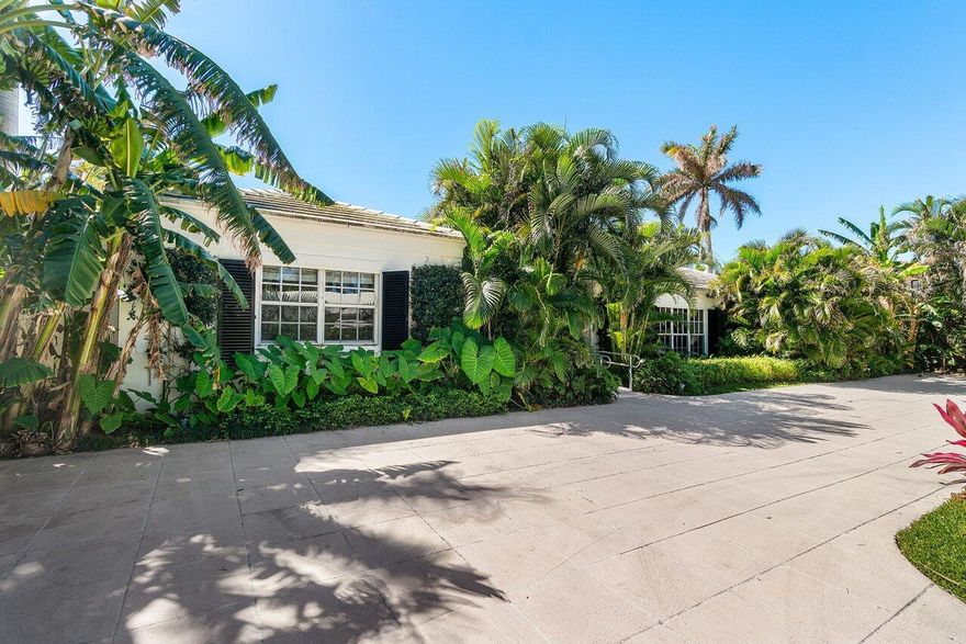 Prime location, Bermuda style home on a royal palm-lined street on the North End of Palm Beach with a large lot, with rear access from Via Marila, and just two houses from the beach. The property features a pool surrounded by tropical landscaping, an updated kitchen with marble countertops, formal dining room, and an open floor plan for entertaining with wet bar.