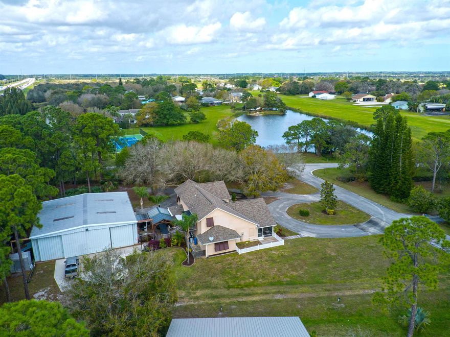 Join the Indian River County growth corridor by investing in your own community private airstrip home. Your aviation dream home is a 2 story Concrete block/stucco w/2nd story frame home w/5 bedrooms 3.5 baths and a fully functioning in-law quarters offering an updated designed for modern living w/an open concept living, dining & kitchen area creating space that is both inviting & works w/natural lighting providing a vibrant atmosphere. Experience the freedom to fly w/your private 50X50 2,500sqft red iron commercial airplane hanger featuring 16ft high vaulted ceilings. Extraordinary opportunity