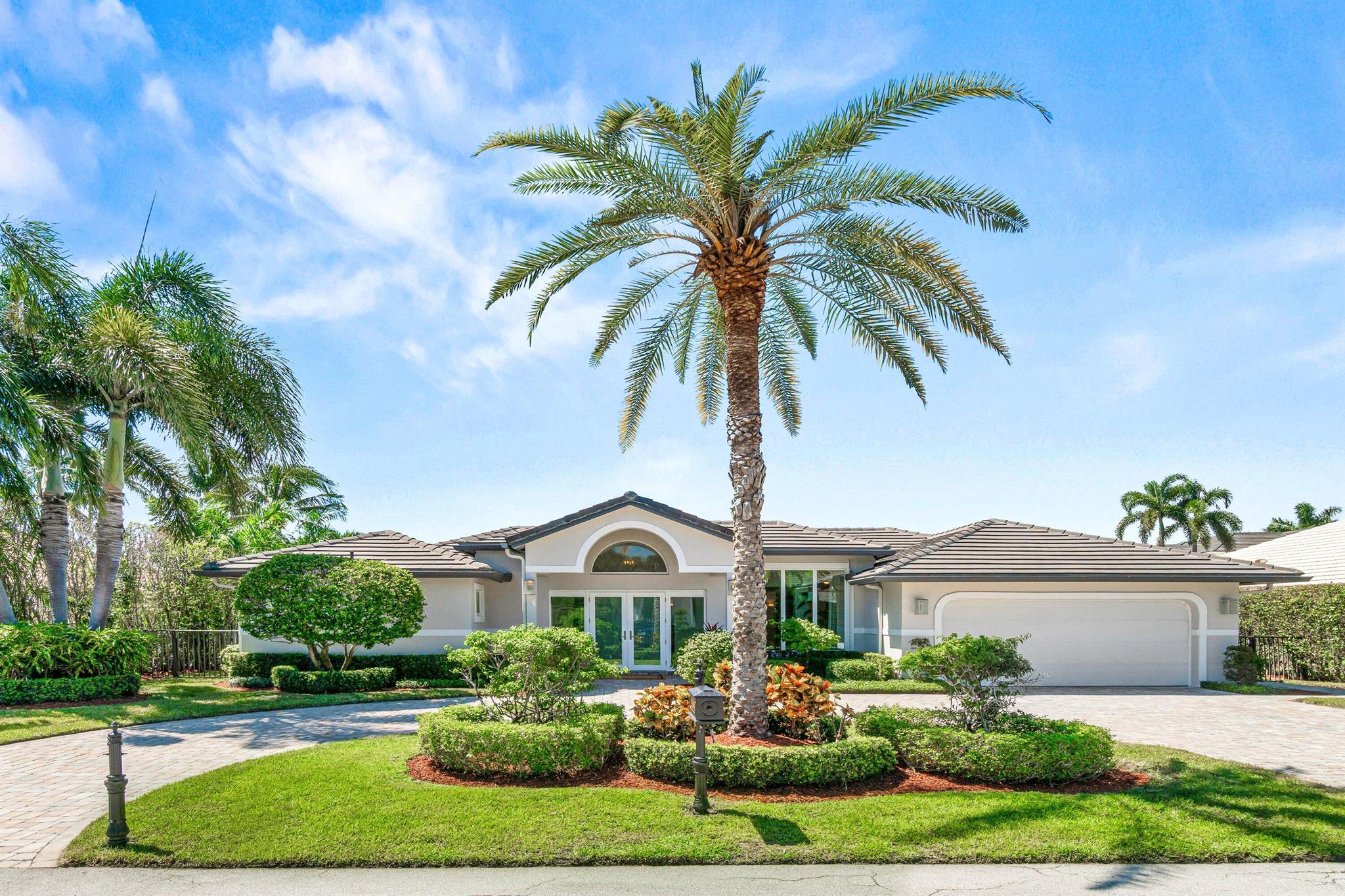 Beautifully reimagined in 2025, this elegant 5-bedroom, 3-bath single-story home in the prestigious Royal Palm Yacht & Country Club blends timeless sophistication with modern comfort. The residence has recently received a complete designer transformation, featuring all-new furnishings and curated decor throughout. Every element reflects thoughtful attention to detail--from Wolf and Sub-Zero appliances to Italian porcelain flooring, custom millwork, and impact-rated windows and doors. Raised ceilings and an open plan create an airy ambiance, while the resort-style pool and lush tropical landscaping complete this refined Boca Raton retreat.