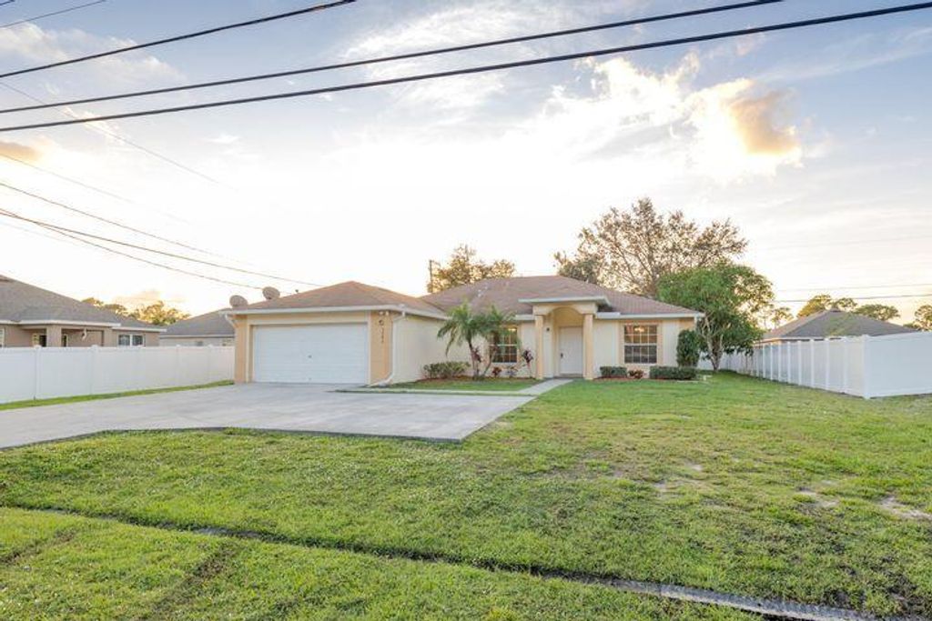 Photo of 3282 SW Savona Boulevard, Port Saint Lucie, FL 34953 (MLS # R10945978)