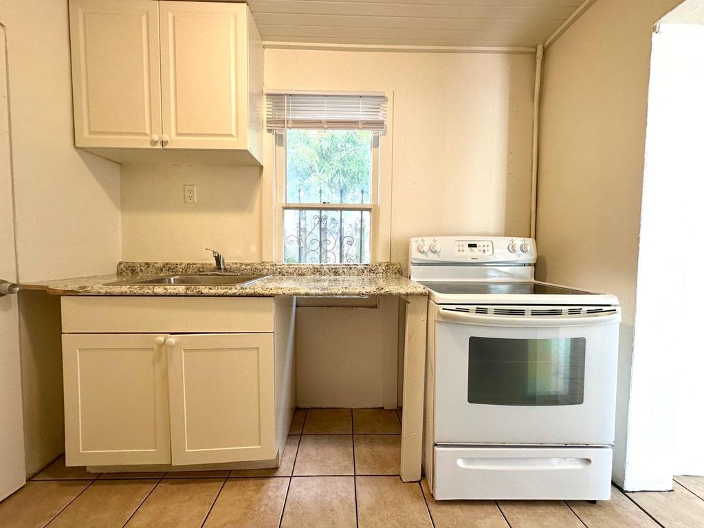 Photo of 633 40th Street, West Palm Beach, FL 33407 (MLS # B26025738)