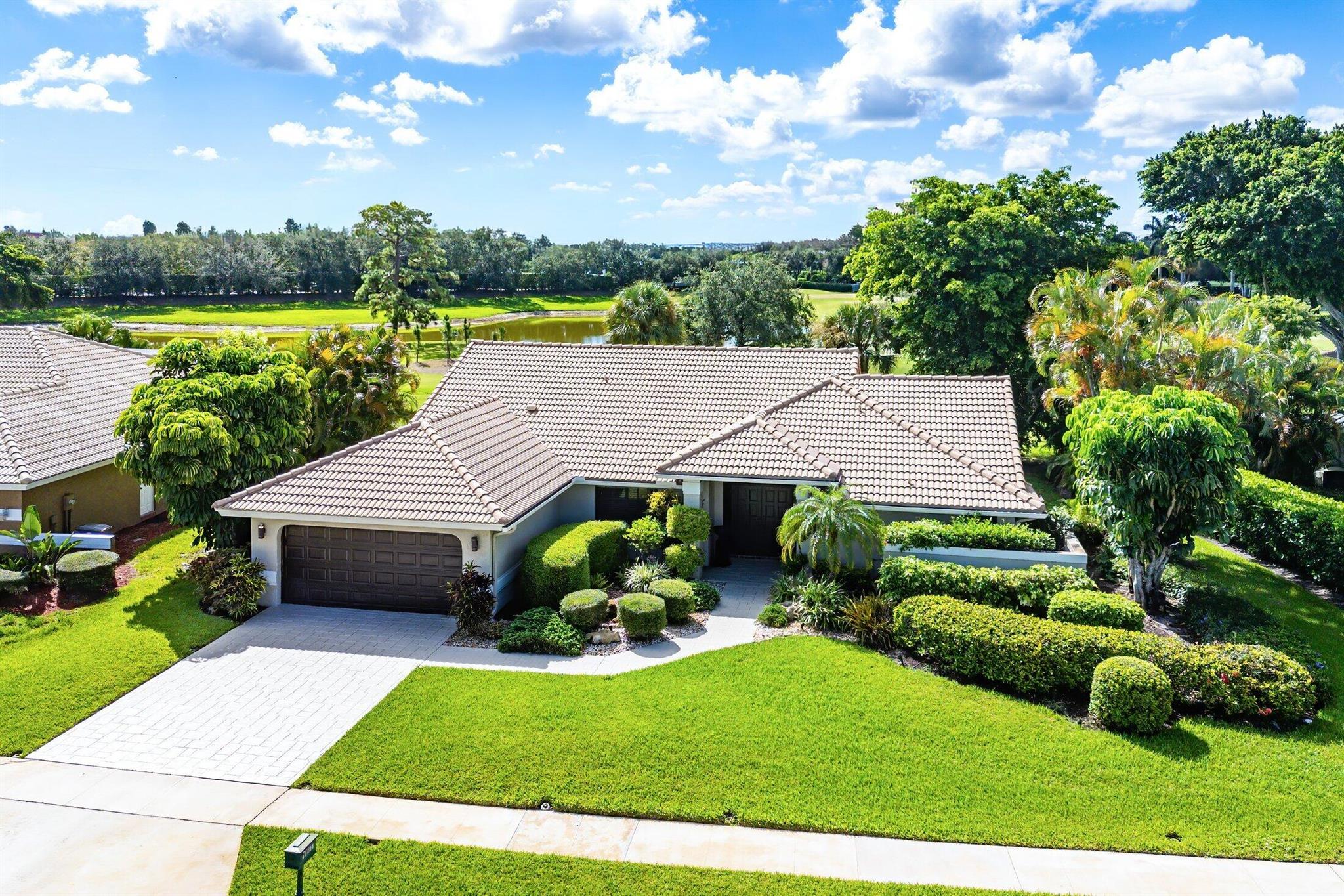 Set in the prestigious Boca Woods Country Club, this meticulously maintained 3-bedroom, 2-bath home offers a perfect blend of elegance and functionality offering privacy and comfort for both owners and guests. Serene views of the pool and golf course can be seen from the living room, kitchen, and primary bedroom while the screened patio provides an inviting space for relaxation and entertaining. Boca Woods Country Club Community offers resort style amenities, including two championship golf courses, Har Tru tennis courts, pickleball courts, state of the art fitness center, spa, game room, fully renovated clubhouse with fine dining and much more! Mandatory Country Club membership required $120,000.
