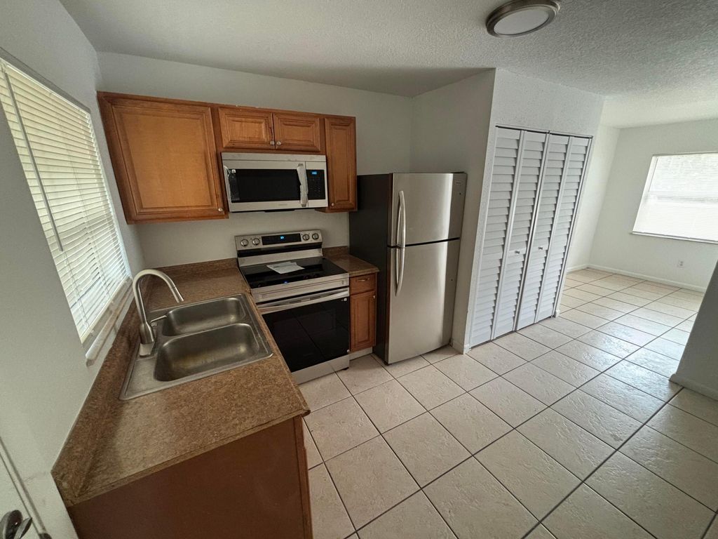Photo of 5108 Sanibel Ave #B, Fort Pierce, FL 34951 (MLS # B26000207)