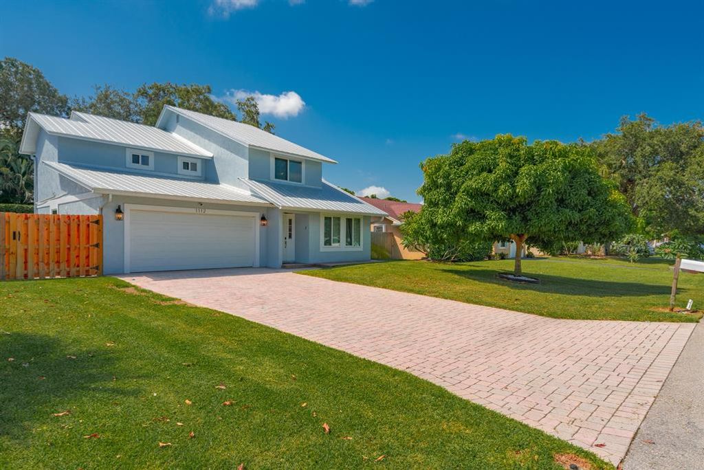 Photo of 1112 Rainwood Circle, Palm Beach Gardens, FL 33410 (MLS # R10745185)