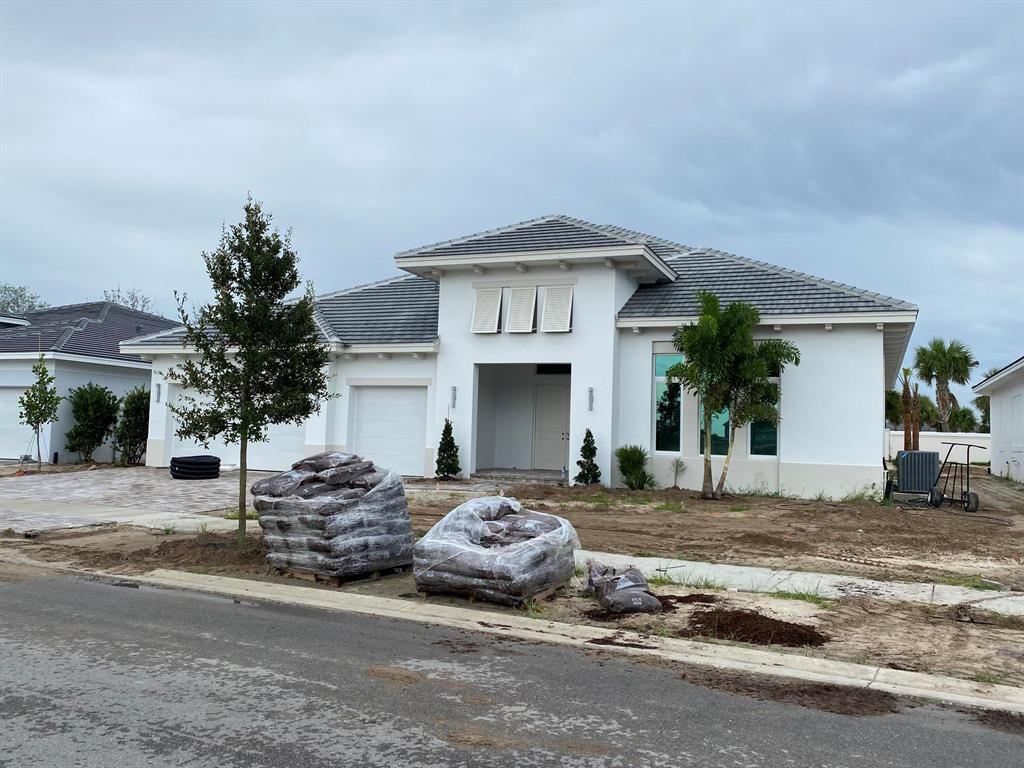 Photo of 9372 Coral Isles Circle, Palm Beach Gardens, FL 33412 (MLS # R10727889)