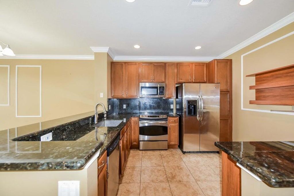 Photo of 9687 Lago Drive, Boynton Beach, FL 33472 (MLS # B26037443)