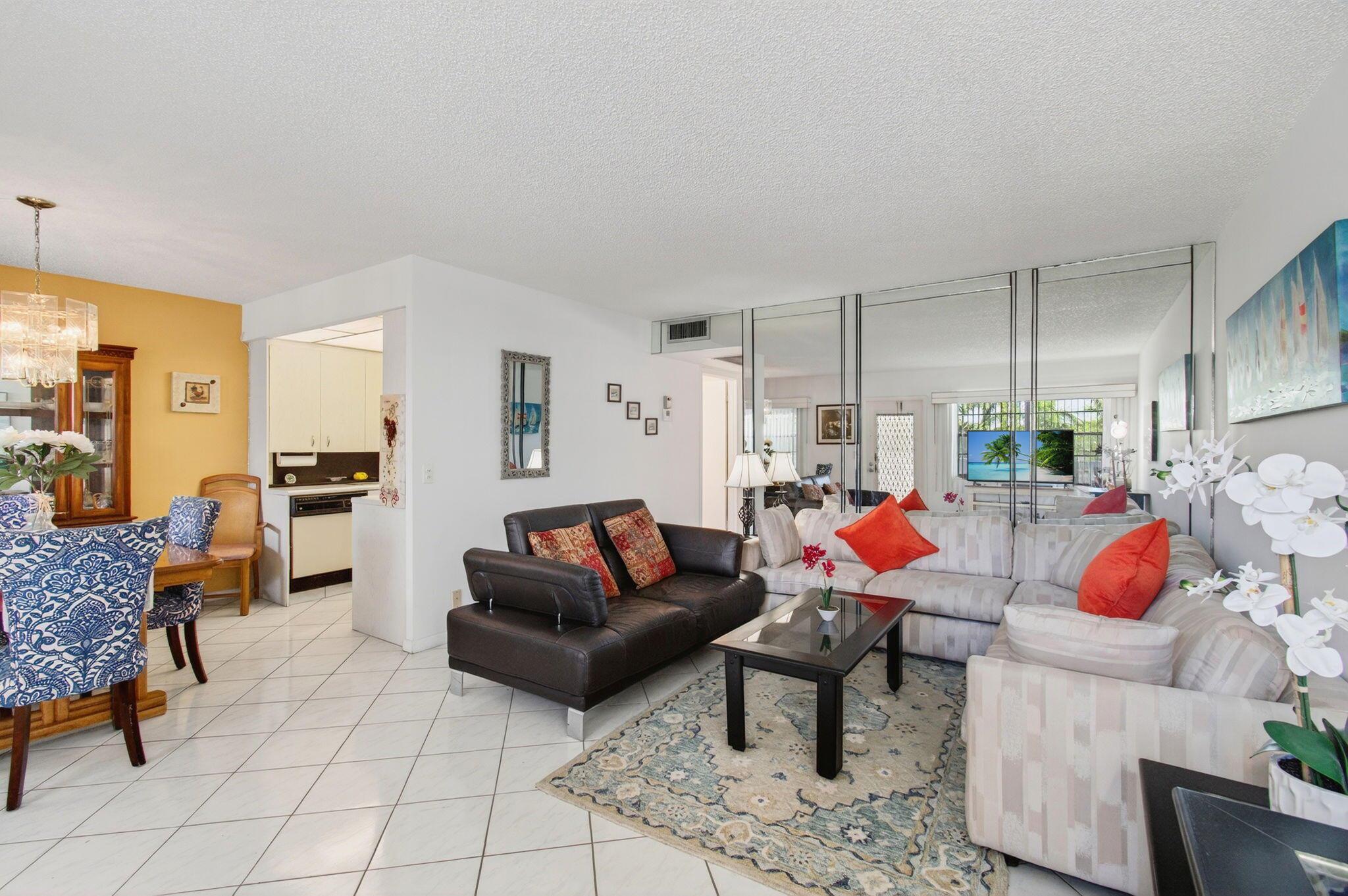 CENTURY VILLAGE--ACTIVE ADULT COMMUNITY--55+ Community. Sitting at the heart of Boca Raton, a rare investment opportunity welcomes you at 3014 Exeter A. This property, located in the prestigious Exeter section of Century Village, is prime real estate. The third-floor positioning of this unit affords an elevated degree of privacy and a stunning view of the surrounding landscape.The property is flanked by water bodies, presenting an idyllic setting that effortlessly calms the senses - a haven where the rustle of the leaves and the gentle lapping of the lake can become a part of your daily soundscape.