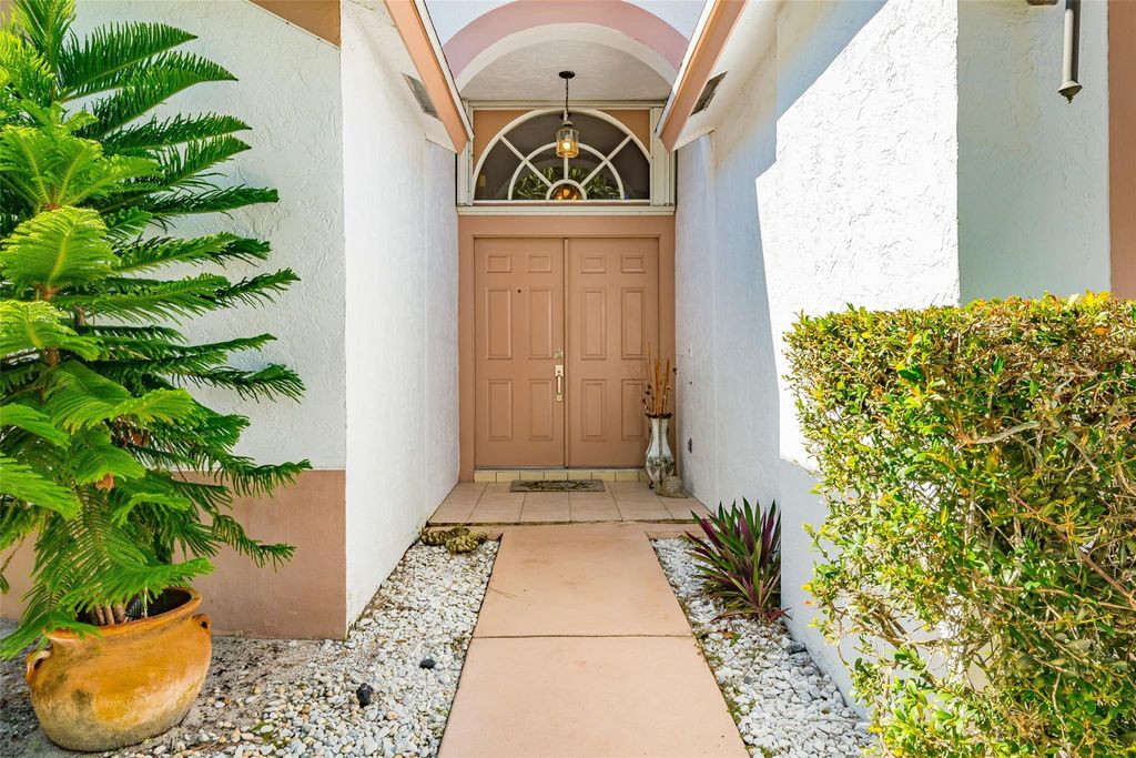 Photo of 140 Paddock Lane, Greenacres, FL 33413 (MLS # F10516783)