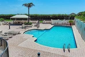 Photo of 800 Ocean Drive #404, Juno Beach, FL 33408 (MLS # B26036650)