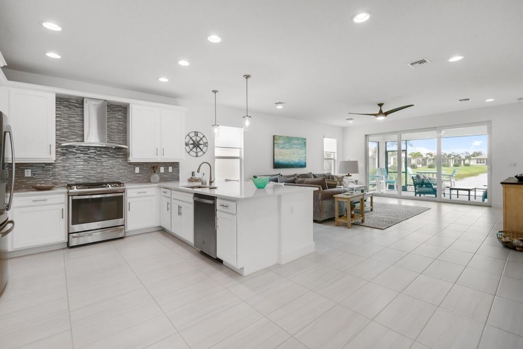 Photo of 13432 SW River Rock Road, Port Saint Lucie, FL 34987 (MLS # R10915967)