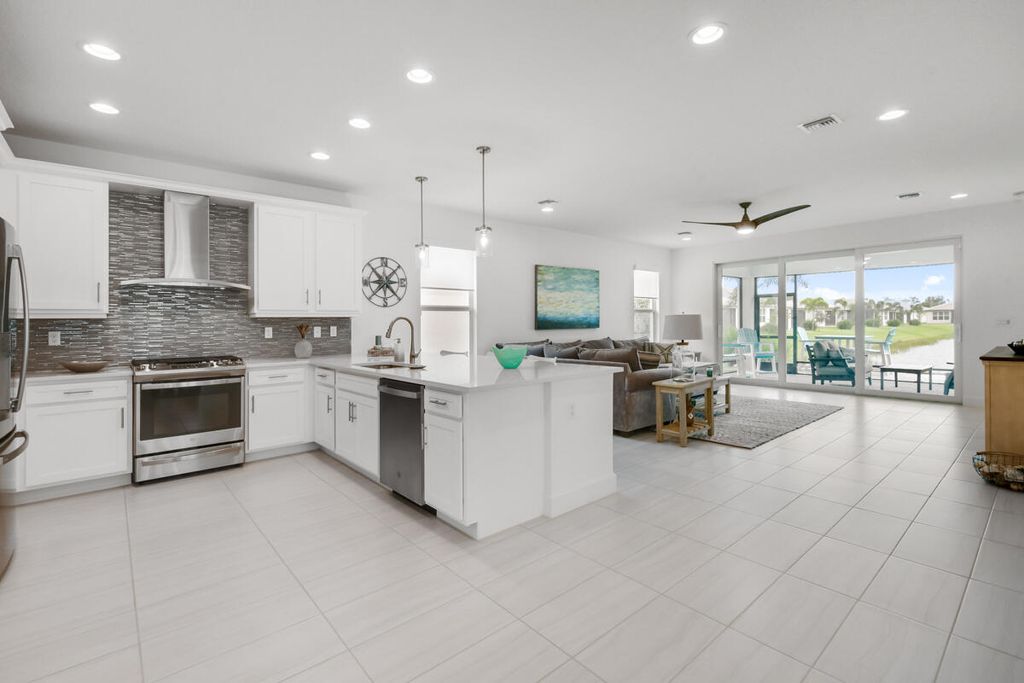 Photo of 13432 SW River Rock Road, Port Saint Lucie, FL 34987 (MLS # R10915967)