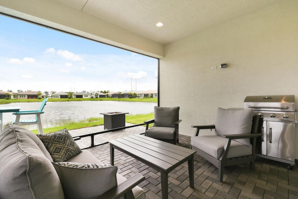 Photo of 13432 SW River Rock Road, Port Saint Lucie, FL 34987 (MLS # R10915967)