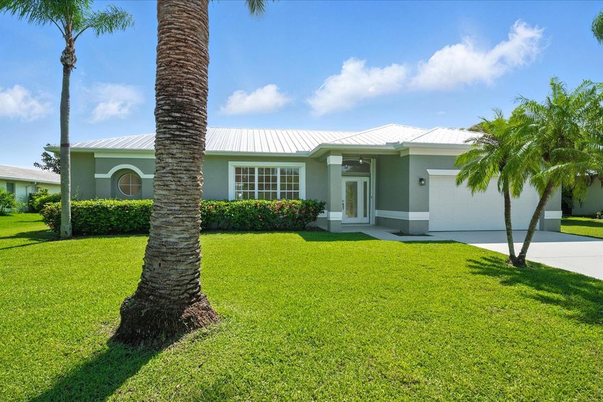 Welcome to your dream home, perfectly situated on a half-acre lot! This beautifully renovated 3-bedroom, 2-bathroom plus den residence offers the perfect blend of style, comfort and location. Every detail inside has been thoughtfully updated with modern finishes, creating a move-in ready oasis that feels brand new.Step inside to an open and airy floor plan featuring a formal living room, dining room, family room and versatile den that can easily serve as a home office. The gourmet kitchen shines with sleek cabinetry, quartz countertops, and stainless-steel appliances.Relax and unwind in the spacious primary suite, complete with a spa-inspired bathroom and generous closet space. Enjoy the Florida lifestyle with a sparkling private pool and expansive patio overlooking a lush golf course--