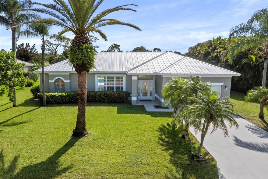 Welcome to your dream home, perfectly situated on a half-acre lot! This beautifully renovated 3-bedroom, 2-bathroom plus den residence offers the perfect blend of style, comfort and location. Every detail inside has been thoughtfully updated with modern finishes, creating a move-in ready oasis that feels brand new.Step inside to an open and airy floor plan featuring a formal living room, dining room, family room and versatile den that can easily serve as a home office. The gourmet kitchen shines with sleek cabinetry, quartz countertops, and stainless-steel appliances.Relax and unwind in the spacious primary suite, complete with a spa-inspired bathroom and generous closet space. Enjoy the Florida lifestyle with a sparkling private pool and expansive patio overlooking a lush golf course