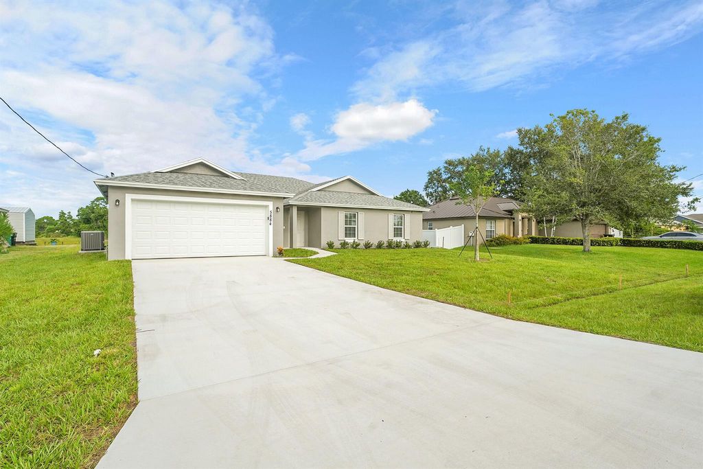 Photo of 5884 NW Files Court, Port Saint Lucie, FL 34986 (MLS # R11114787)