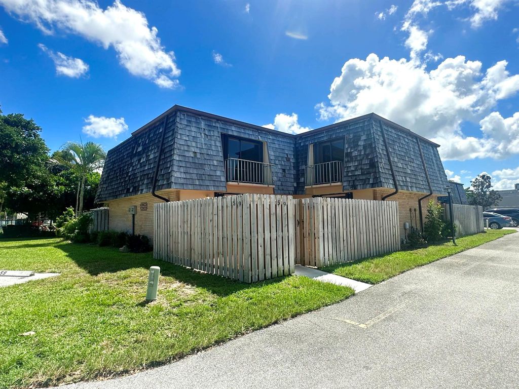 Photo of 59 Lake Arbor Drive, Palm Springs, FL 33461 (MLS # R11114482)