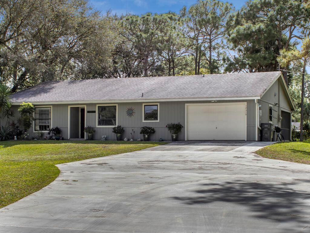 Photo of 12310 52nd Road N, West Palm Beach, FL 33411 (MLS # R10934713)